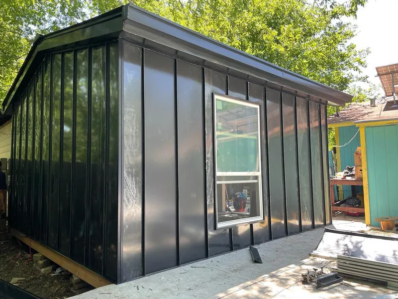 Black standing seam metal wall panels for Roof Inspection in Pike Road